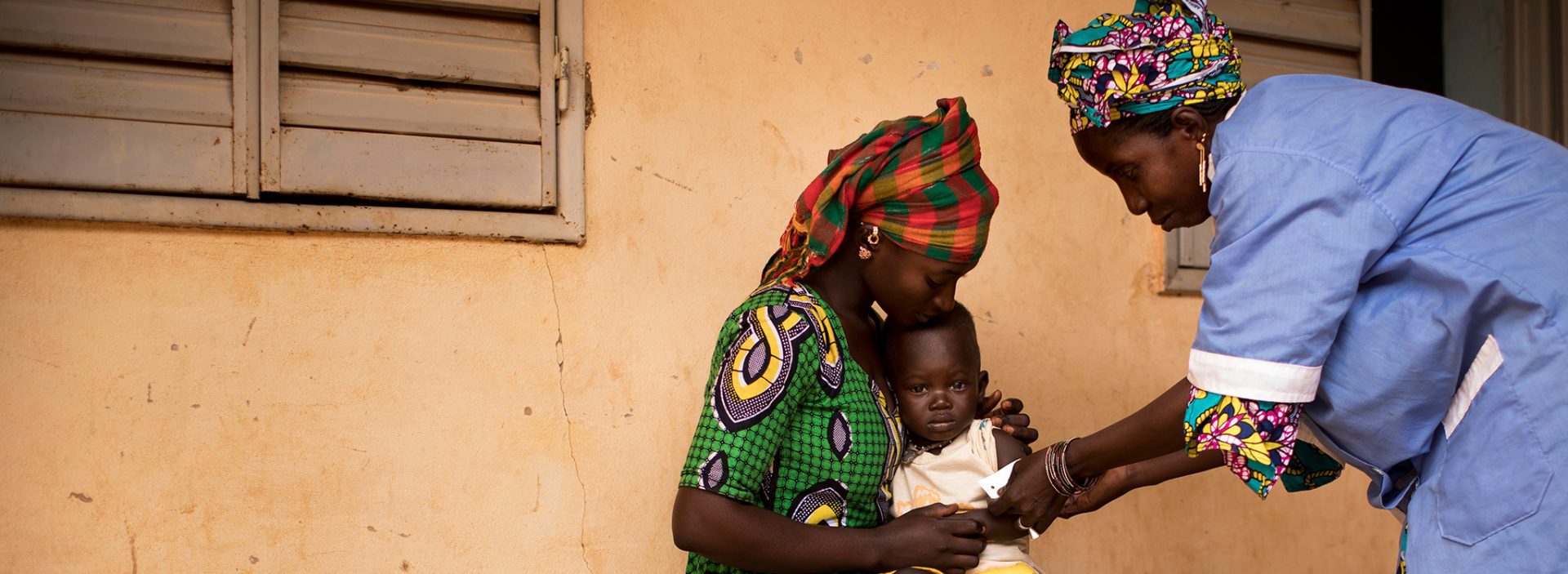 A boy is screened for malnutrition at an Action Against Hunger treatment centre in Mali.
