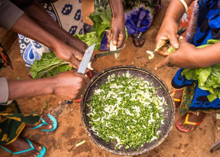 Women preparing food supported by Action Against Hunger.