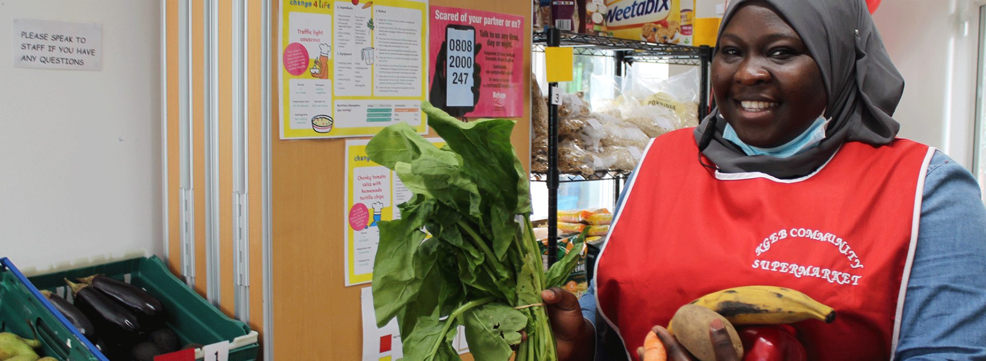 Volunteer at a community store run by Evelyn Community Store and Action Against Hunger partner Lewisham Homes