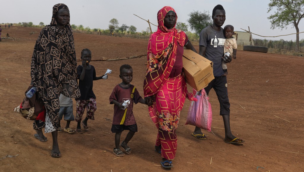 Displaced Sudanese family finding safety.