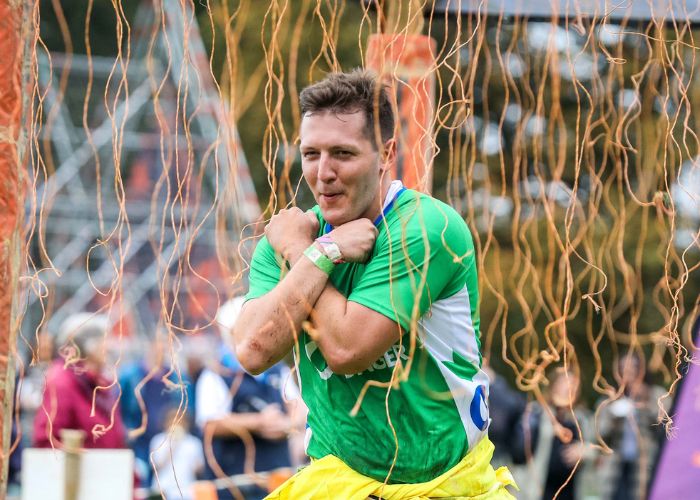 An Action Against Hunger supporter takes part in Tough Mudder.