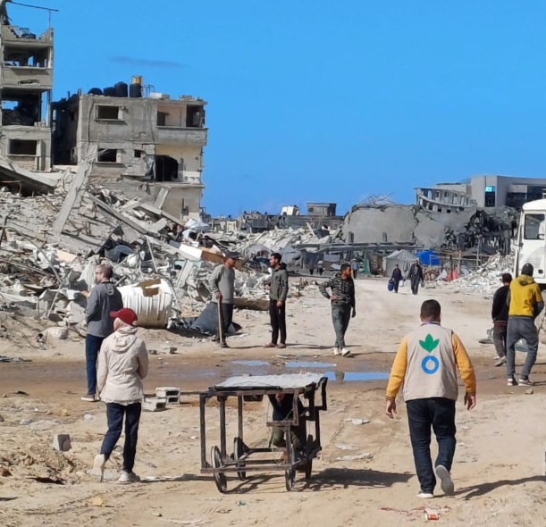 Aid workers in Gaza affected by UK aid cuts amid Action Against Hunger's response.