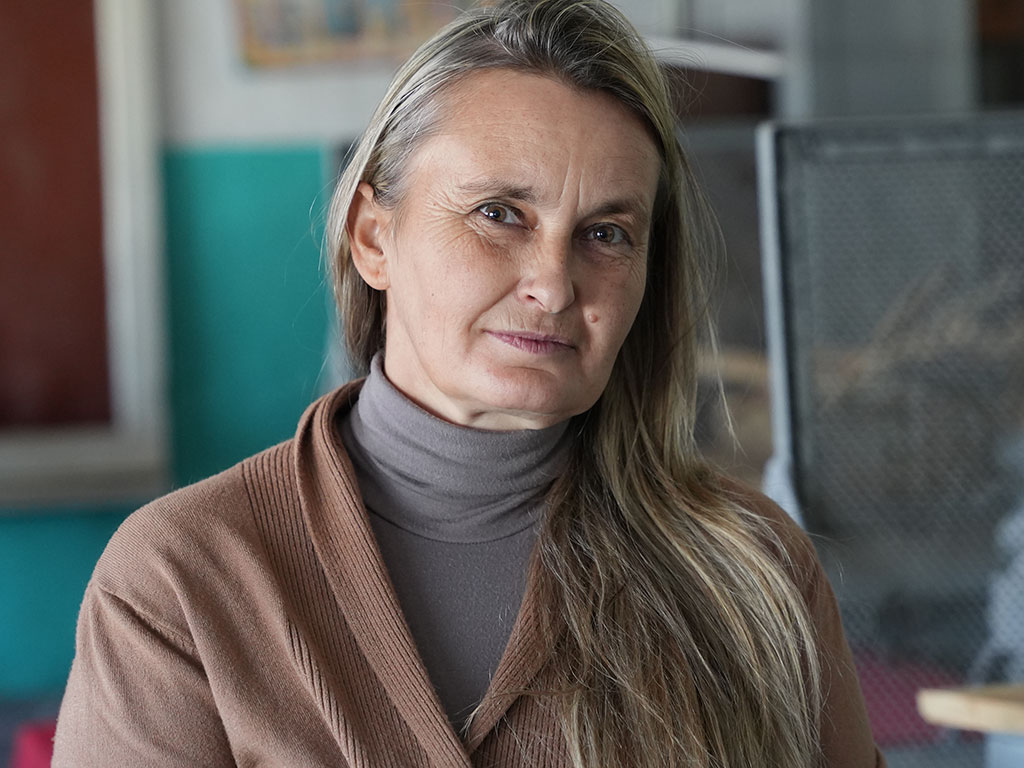 A portrait of Valentyna, a woman who's farmland in Ukraine is now mined. 