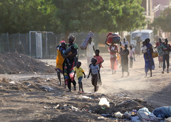 People in Sudan, hunger hotspot of highest concern, fleeing violence.