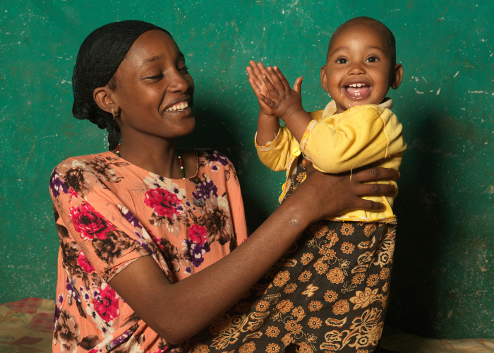 Darmi with her daughter Nadi in Ethiopia. Action Against Hunger's treatment at a stabilisation centre helped saved Nadi's life from malnutrition.